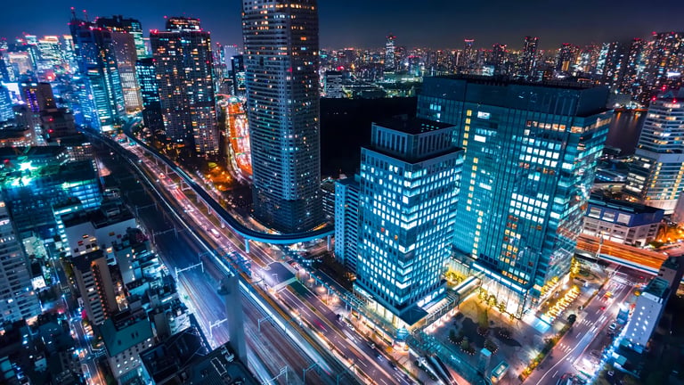 Long exposure photography of a city with buildings and streets with moving lights